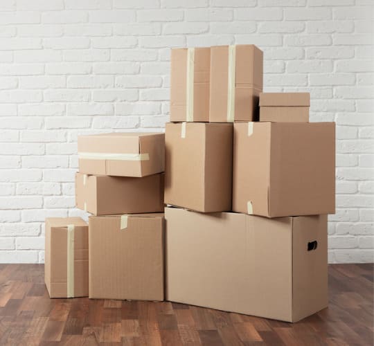 Cartons prêts pour un déménagement groupé avec Grospiron